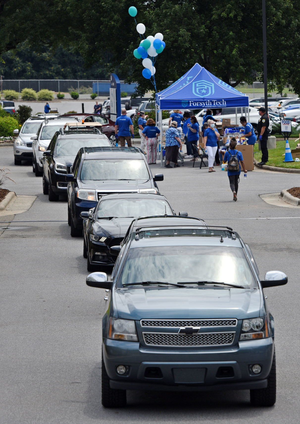 Forsyth Tech logo line of cars